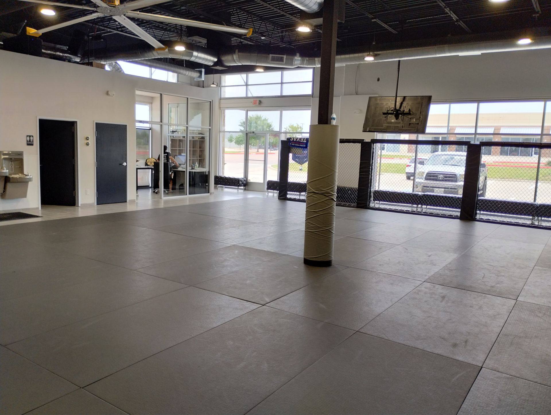 After: the finished space at Rockstar Martial Arts in Frisco, TX, seen from the back