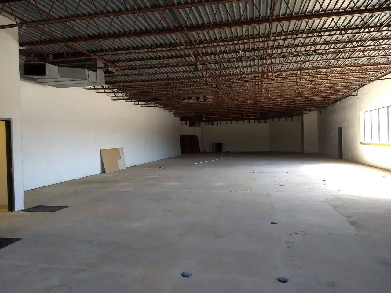 Before: the 10,000-square-foot building, once a Chuck E. Cheese and later a medical practice, that became the beauty supply store