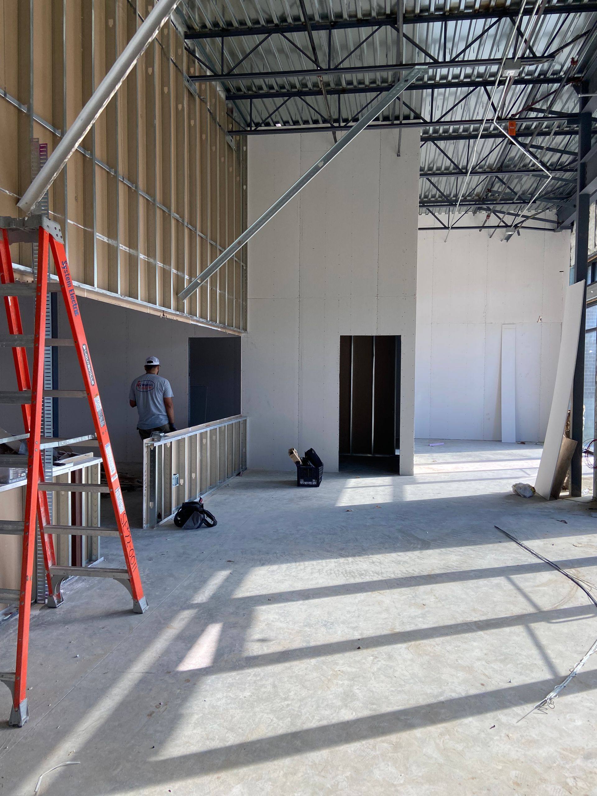 Progress on the Professional Black Belt Academy shell-space finish-out in Melissa, TX