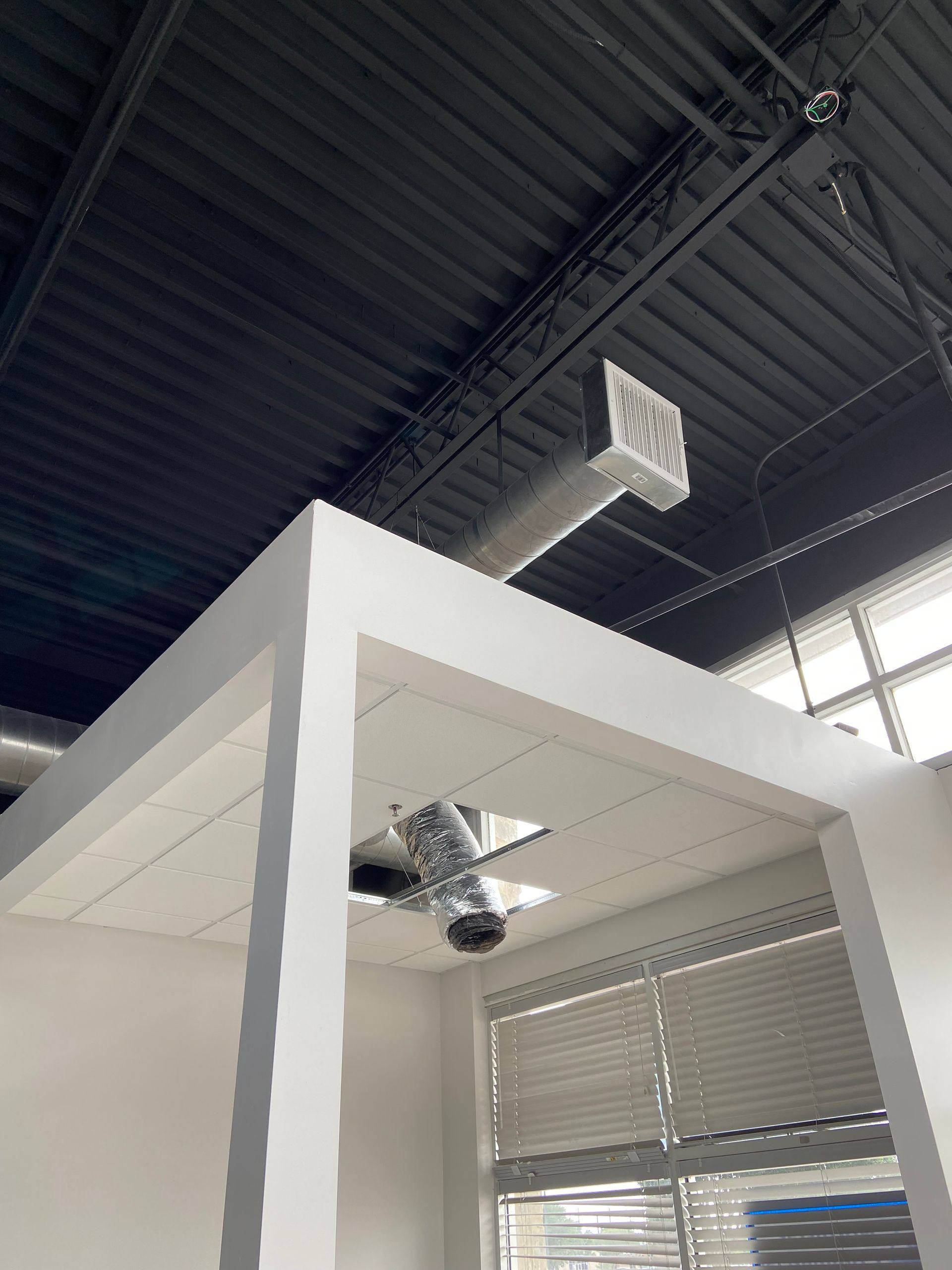 Progress: the glass-wall office framed during the Rockstar Martial Arts remodel in Frisco, TX
