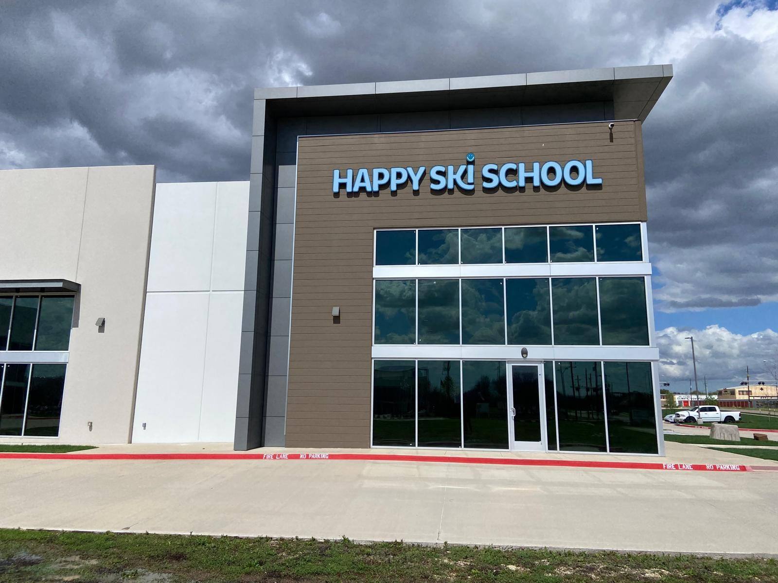 Completed exterior of the Happy Ski School shell space finish-out in Plano, TX