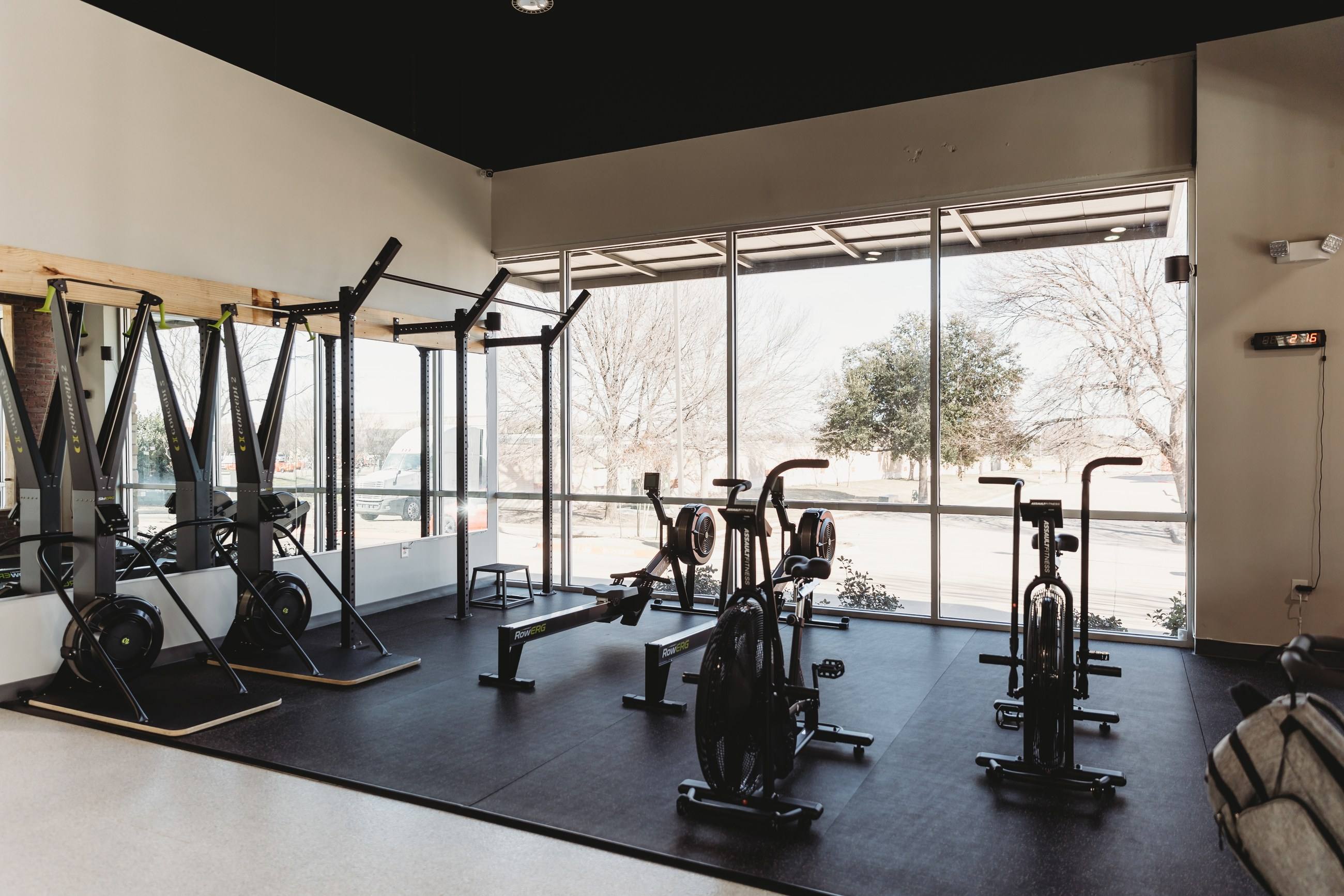 Finished commercial interior with full-height storefront glazing, built by NorthStar Commercial Interiors in North Texas