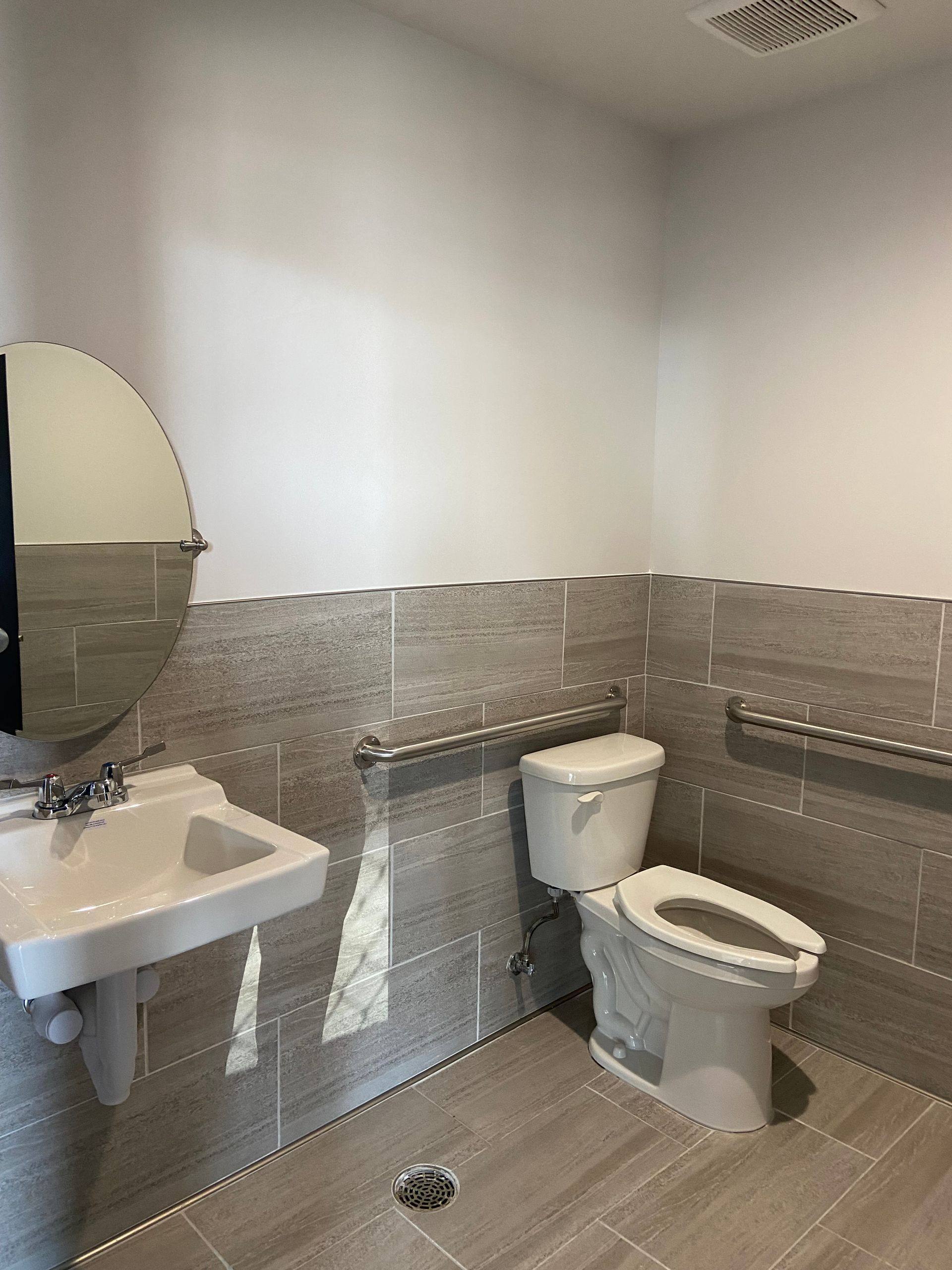 Progress: a relocated bathroom during the Rockstar Martial Arts remodel in Frisco, TX