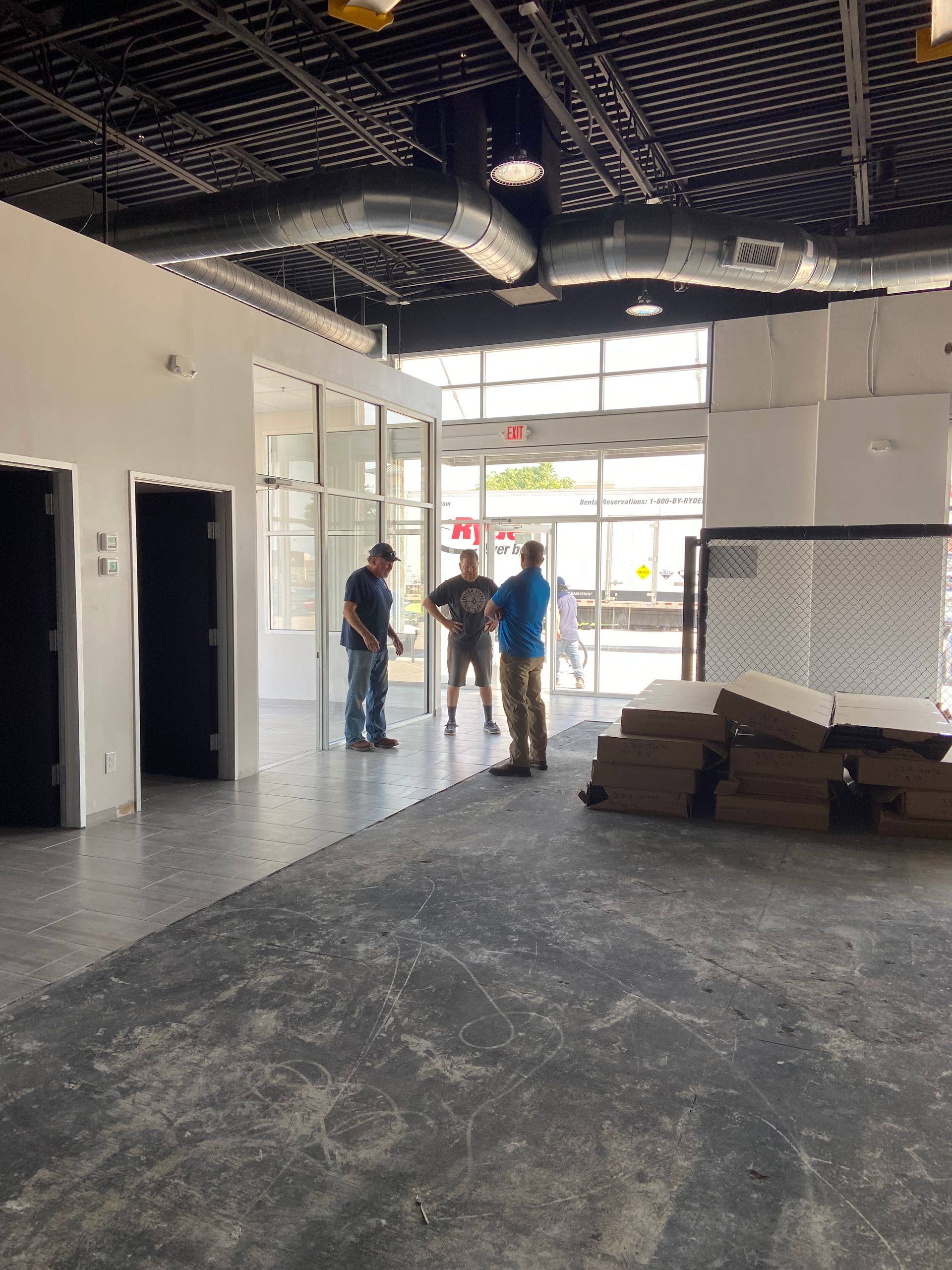 Progress: the open roof deck painted during the Rockstar Martial Arts remodel in Frisco, TX