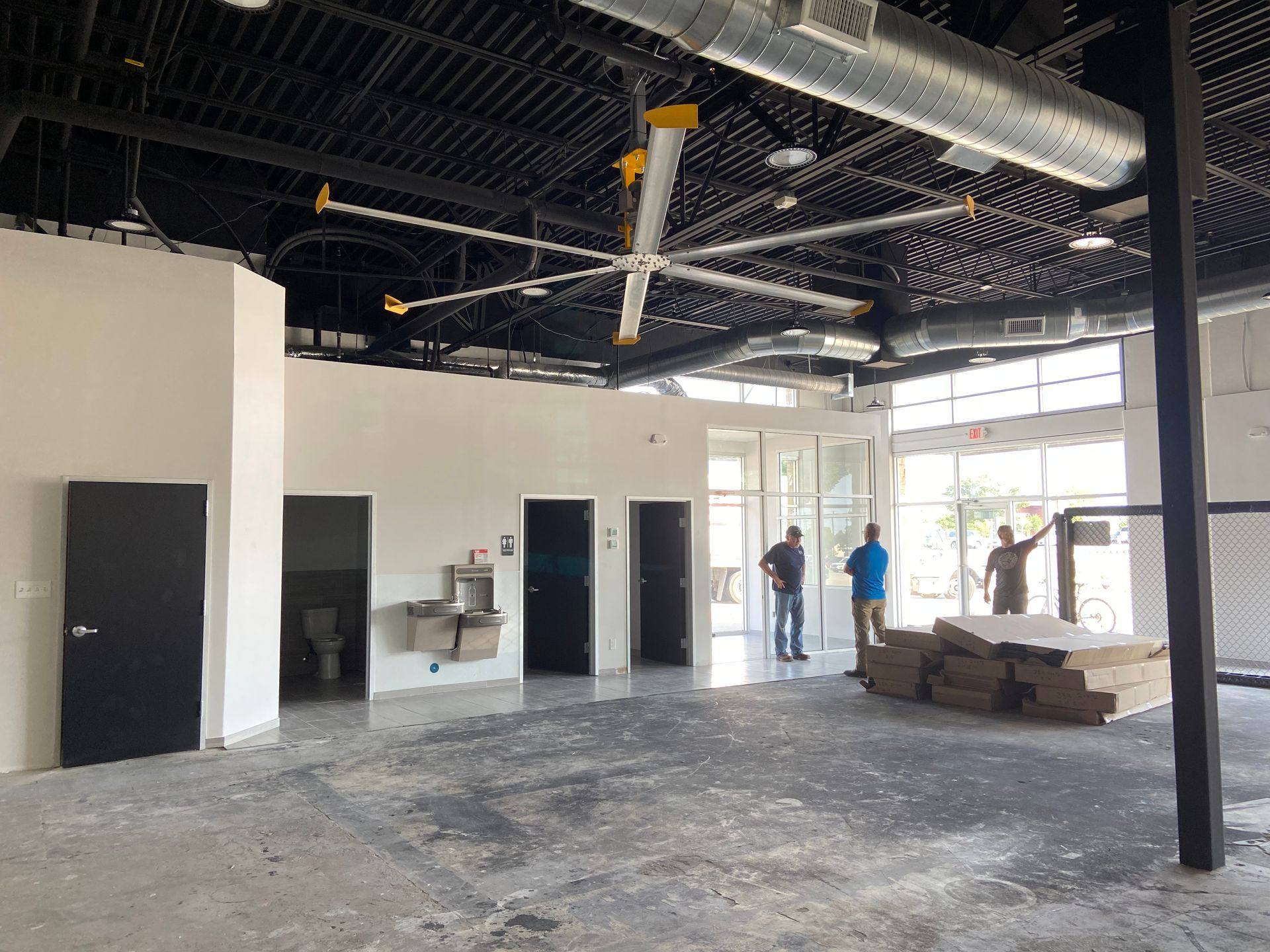Progress: bathrooms and water fountain installed during the Rockstar Martial Arts remodel in Frisco, TX