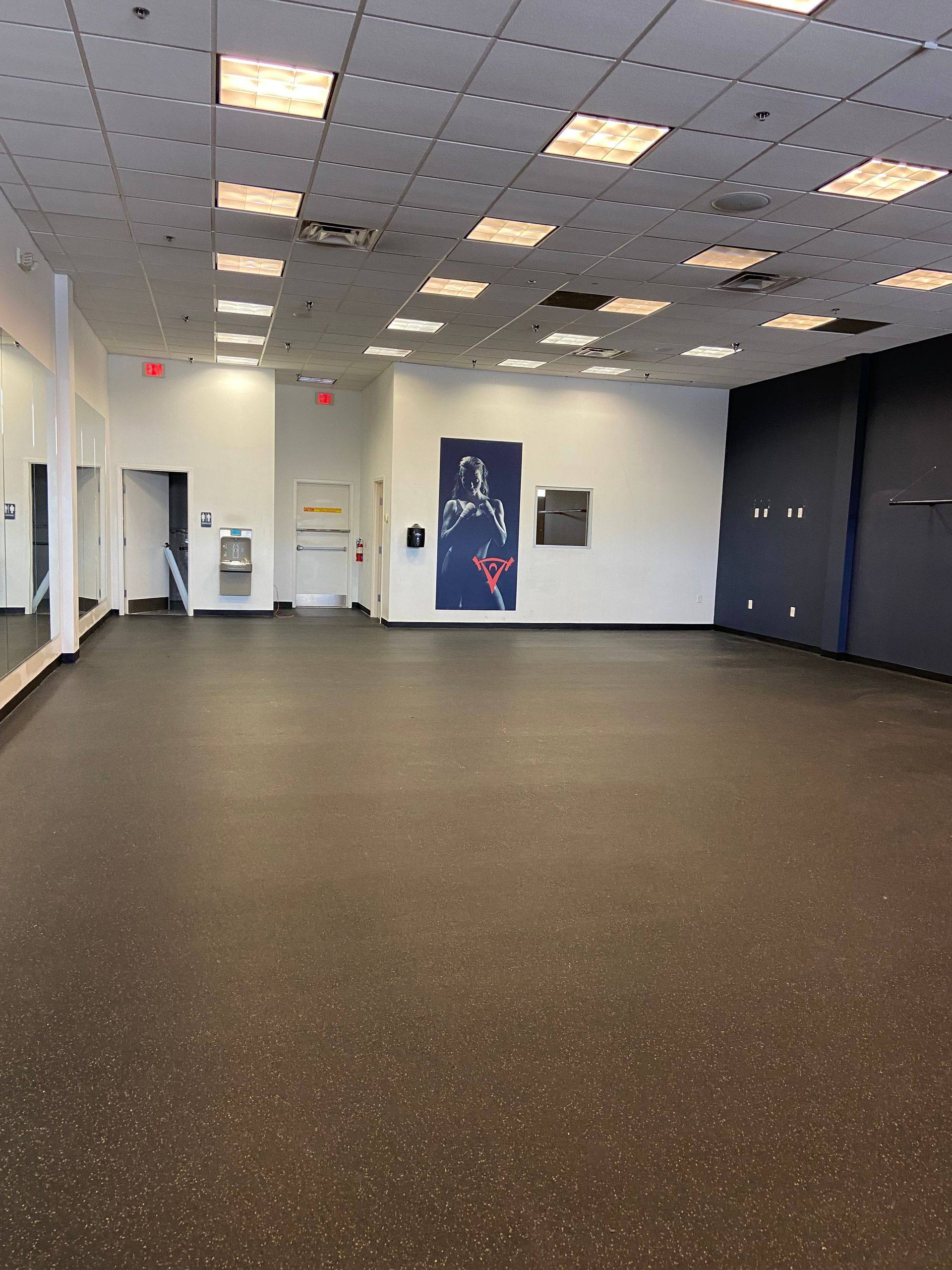Before demolition: looking to the back of the suite that became My Gym in Allen, TX