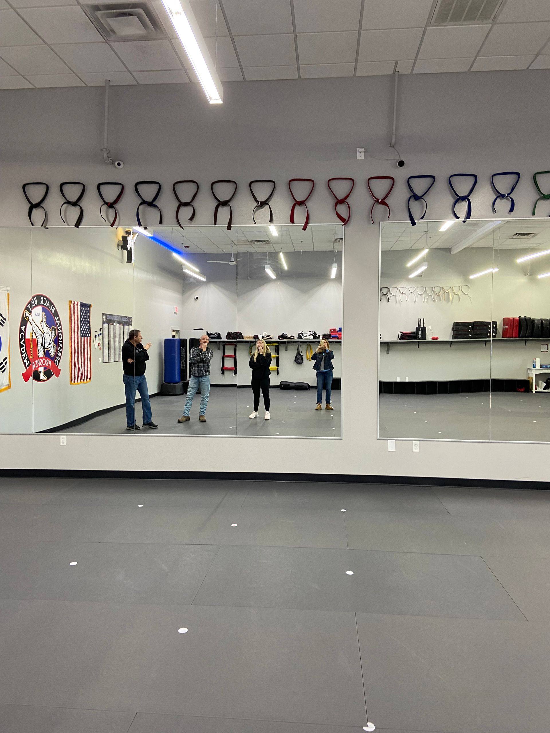 Before: the original paint at Professional Black Belt Academy in Prosper, TX