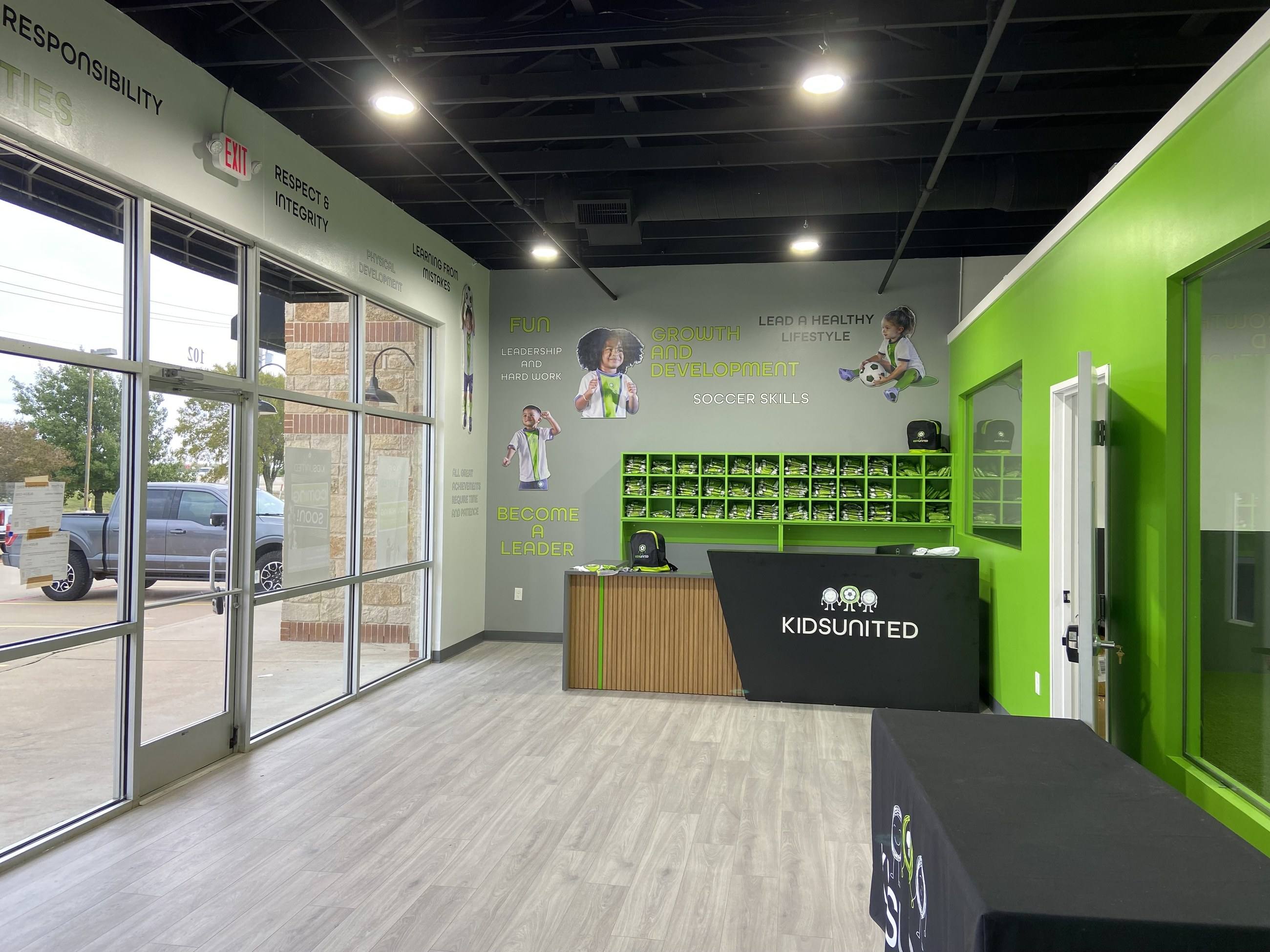 Completed reception and turf training area at Kids United in Plano, TX