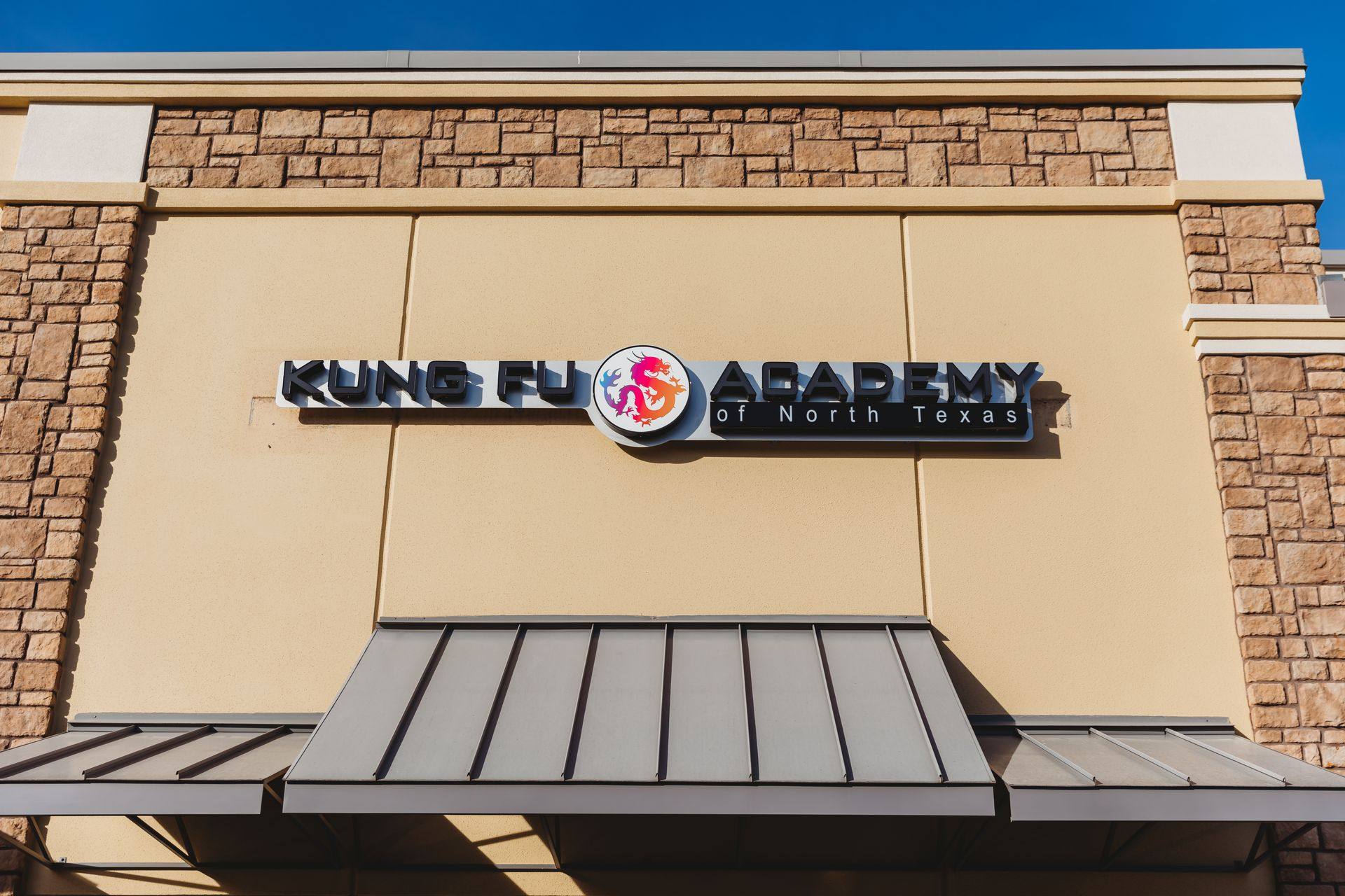After: the Kung Fu Academy of North Texas sign over the entry canopy in McKinney, TX