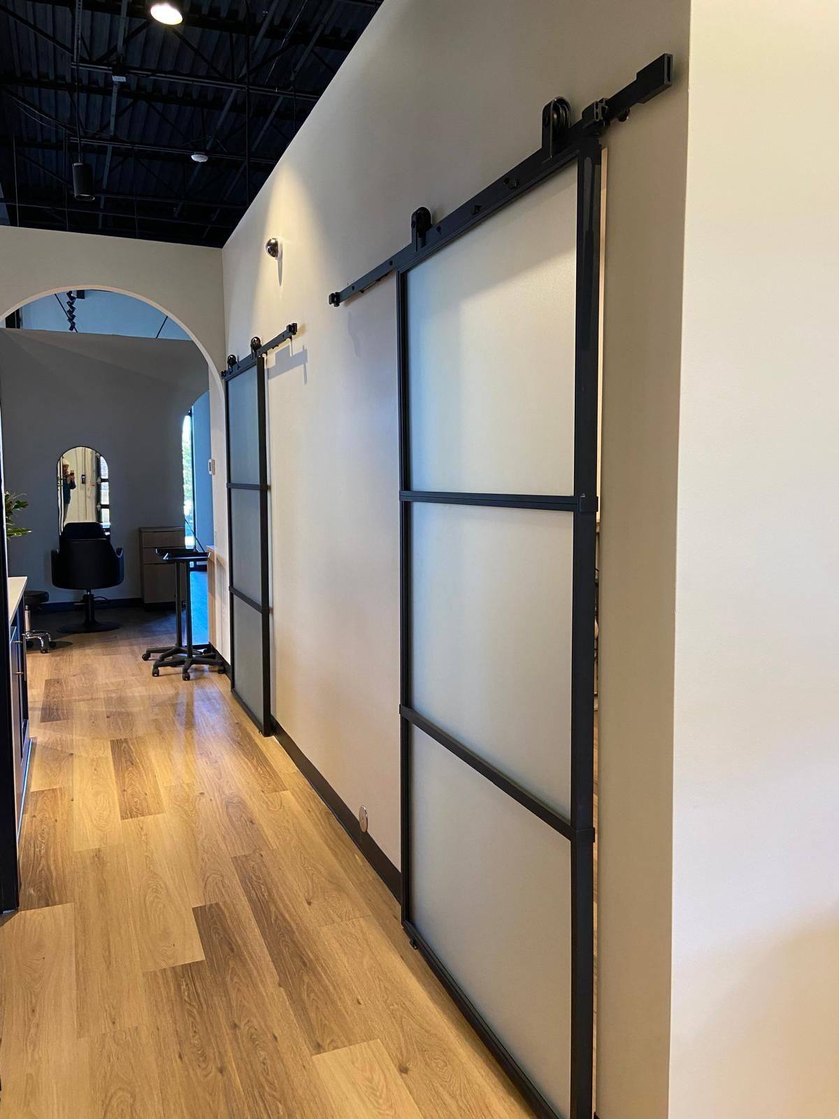 A further view of the salon and boutique NorthStar Commercial Interiors built out for The Society Salon in Melissa, TX