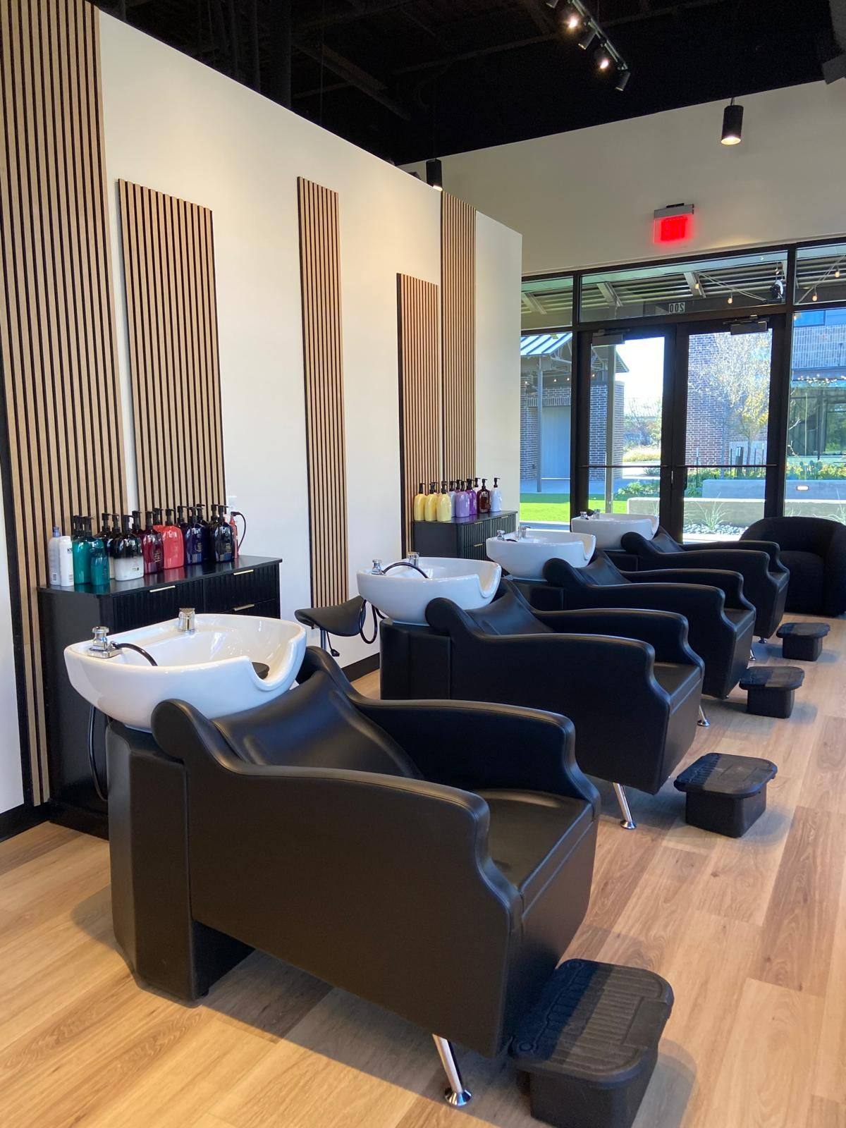 A further view of the salon and boutique NorthStar Commercial Interiors built out for The Society Salon in Melissa, TX